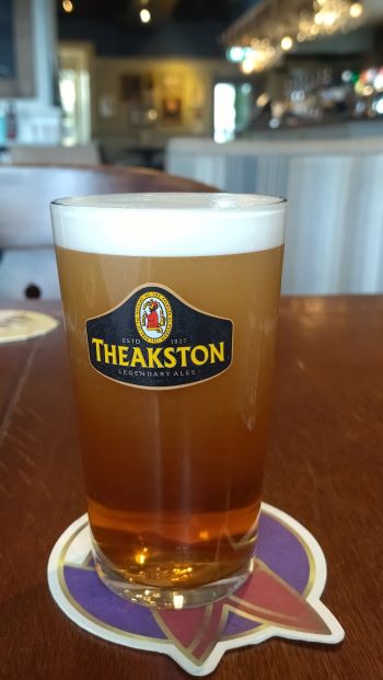 a photograph of a pint of cask ale in an English pub