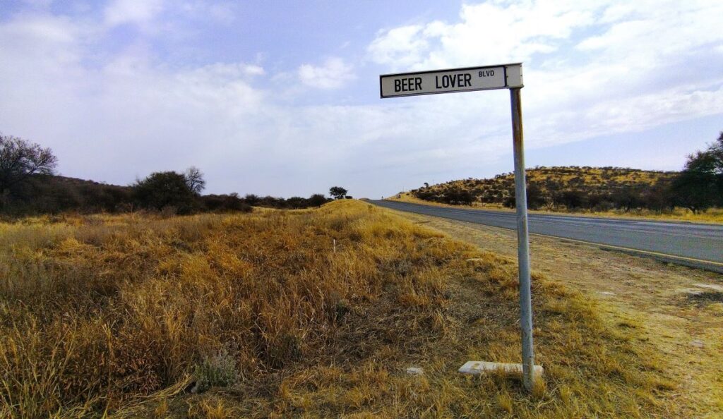 a road sign in namibia that says beer lover's boulevard
